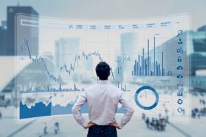 Finance trade manager analysing stock market indicators for best investment strategy, financial data and charts with business buildings in background