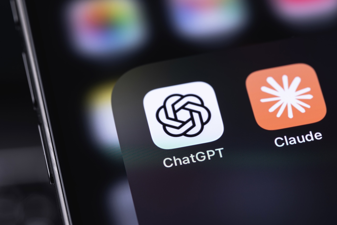 Claude by Anthropic and ChatGPT by OpenAI - mobile icon apps on a screen smartphone iPhone. Claude and ChatGPT are the leading AI chatbots and large language models (LLMs). Batumi, Georgia - March 19, 2026